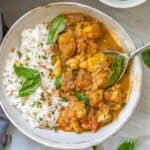 white bowl with kerala chicken and rice