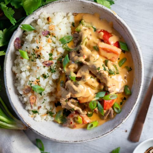 a bolw of beef satay curry with cauliflower rice