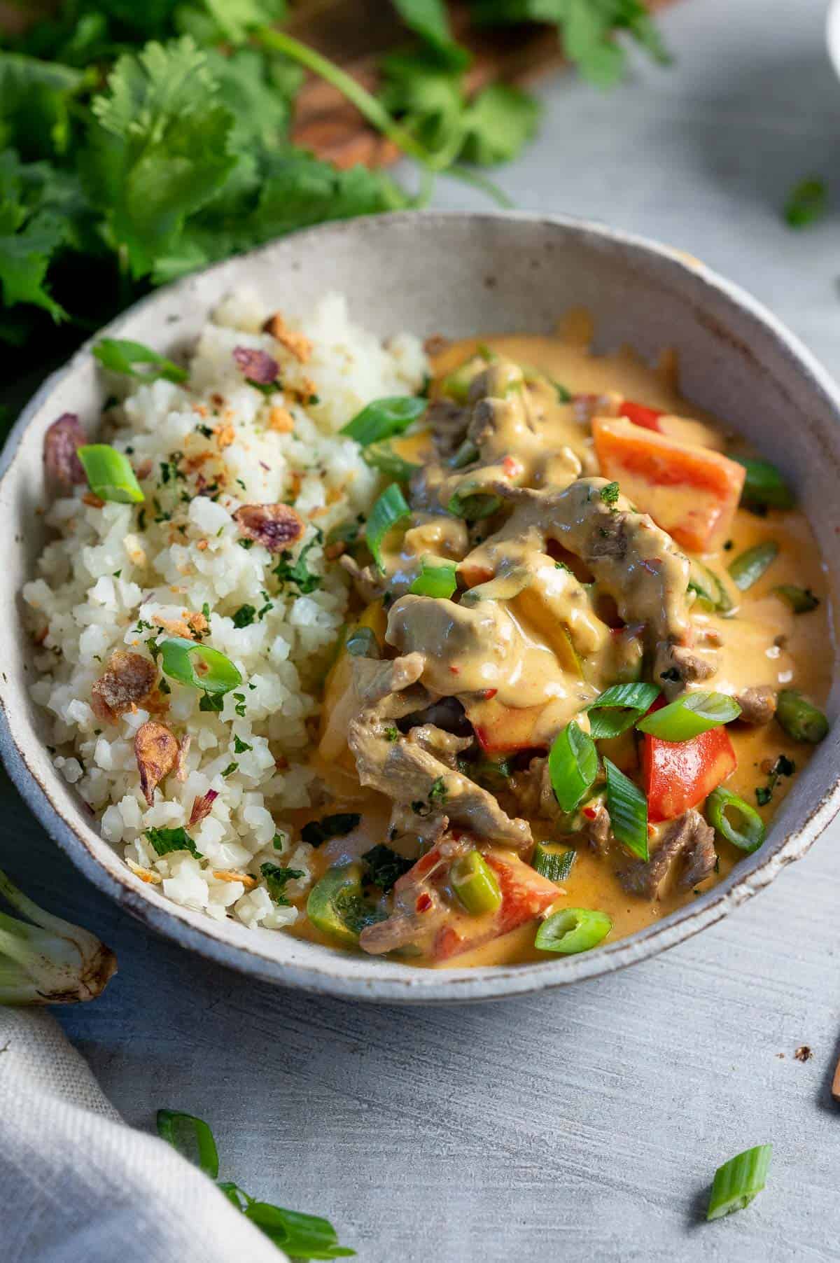 satay beef curry bowl with vegetables