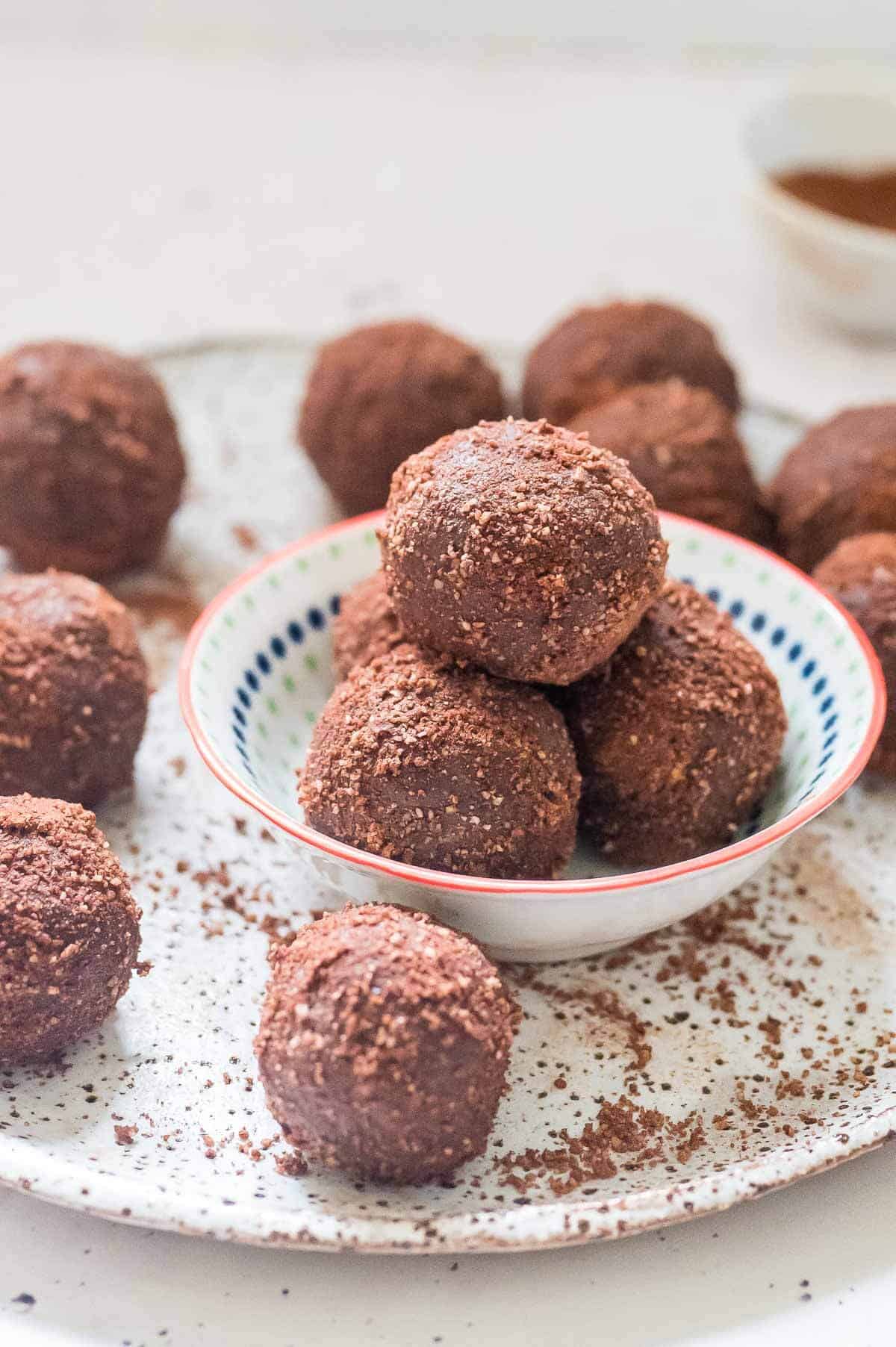 3 date balls stacked in a small bowl