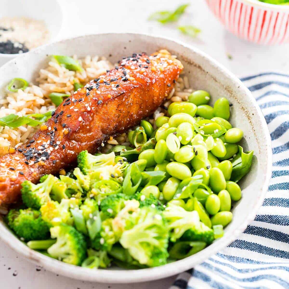 teriyaki salmon with broccoli and edamame in a bowl