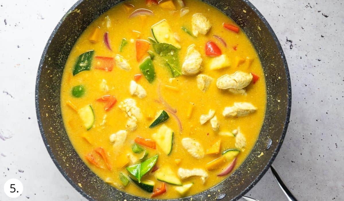 coconut chicken curry in wok