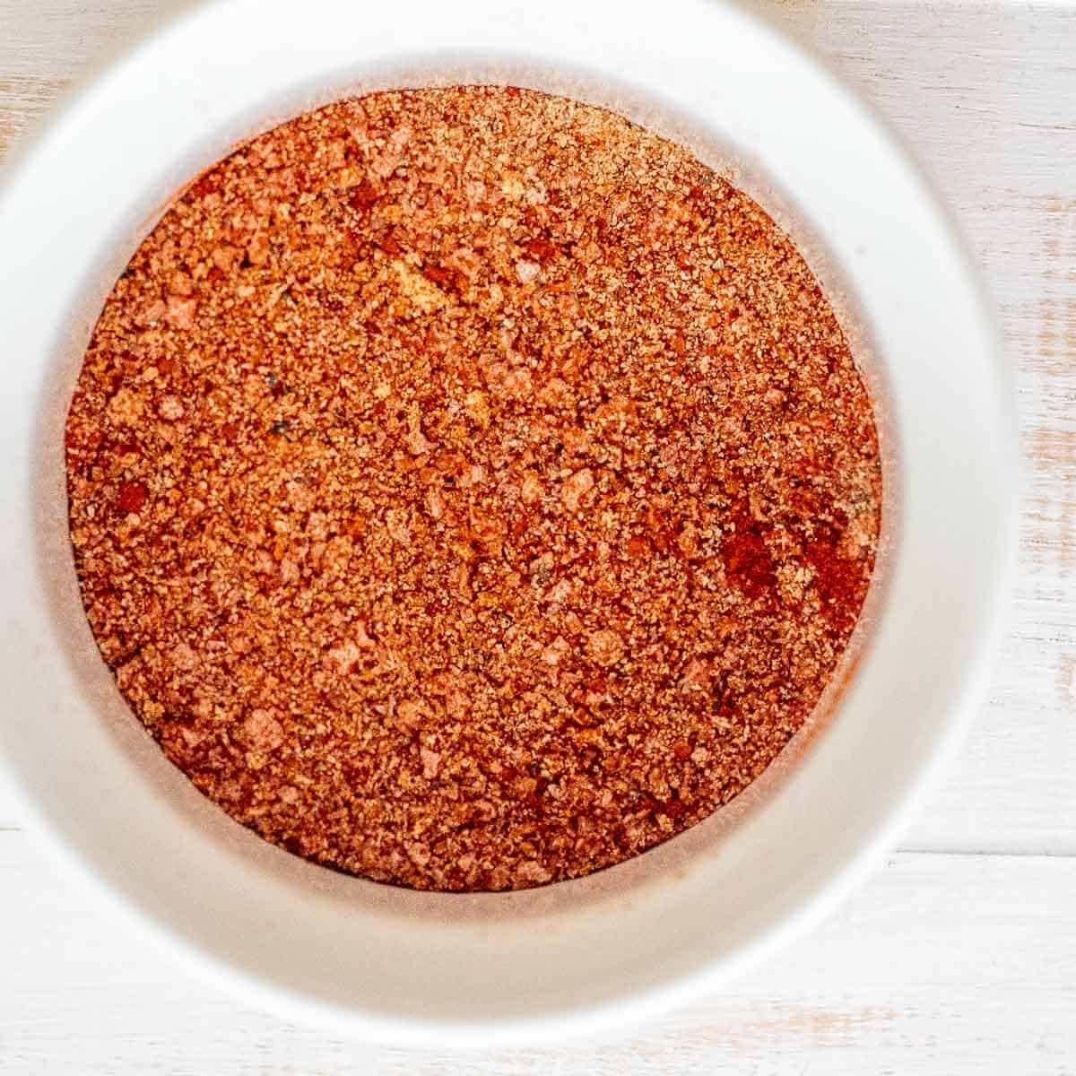 white bowl of spice seasoning for chicken