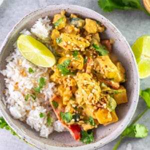 chicken satay curry with rice in a bowl