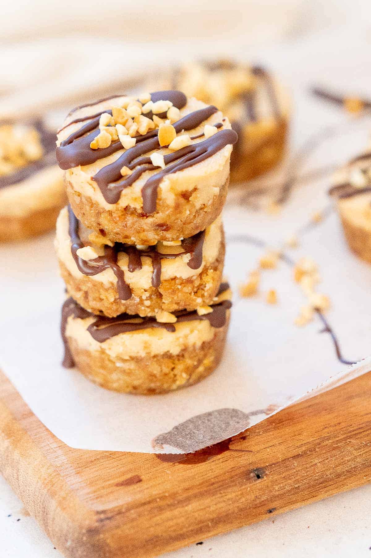 cheesecakes stacked on parchment paper