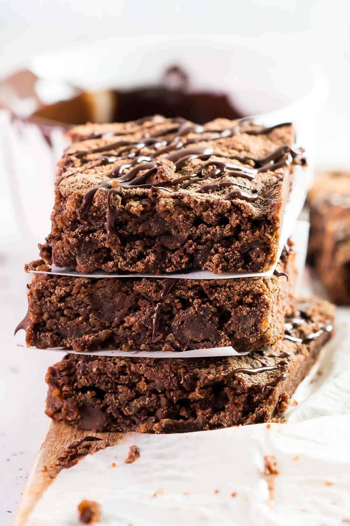 3 brownies stacked with paper separators