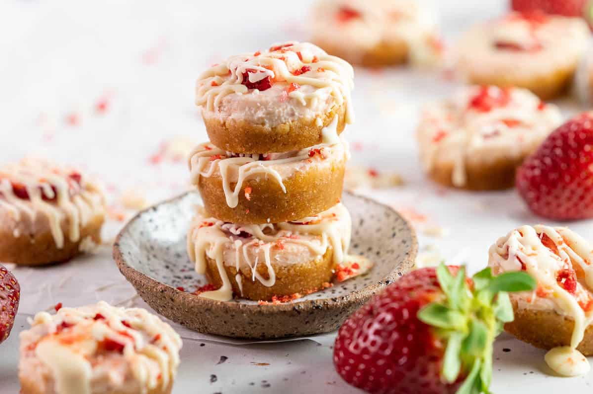 stacked mini cheesecakes on a plate