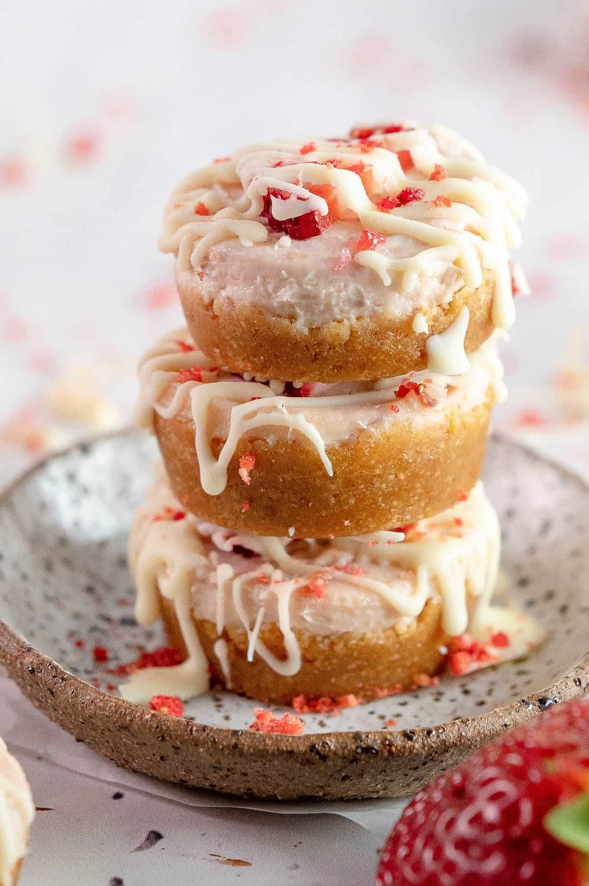 3 stacked mini no bake strawberry cheesecake bites