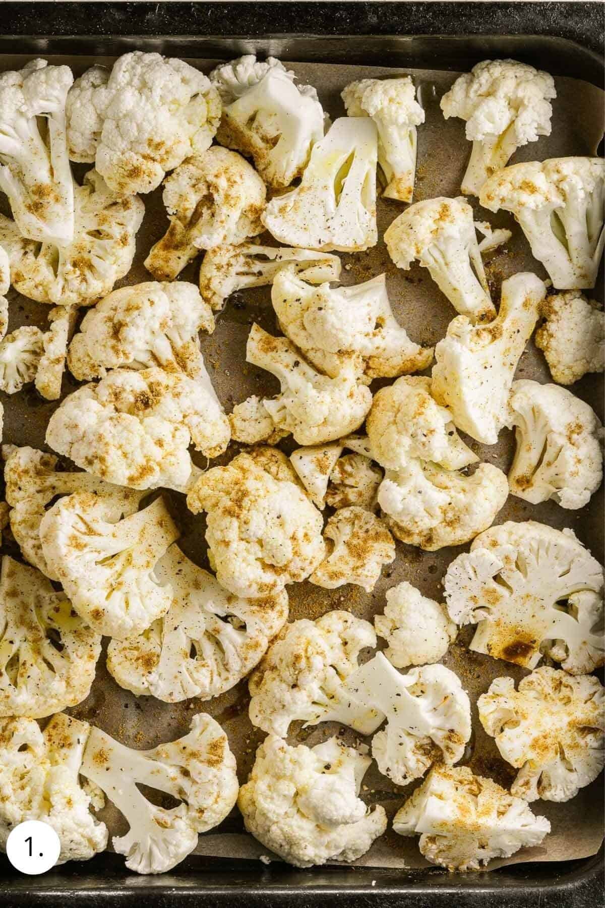 Cauliflower florets in a roasting pan
