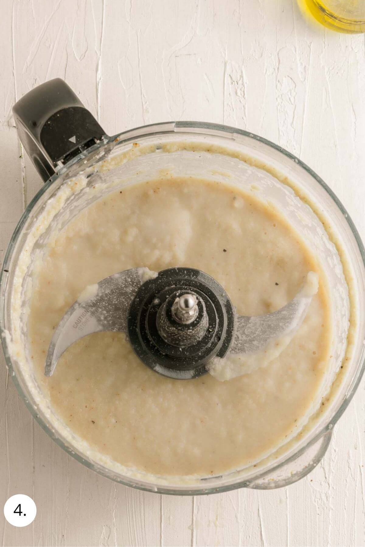 pureed cauliflower in a food processor