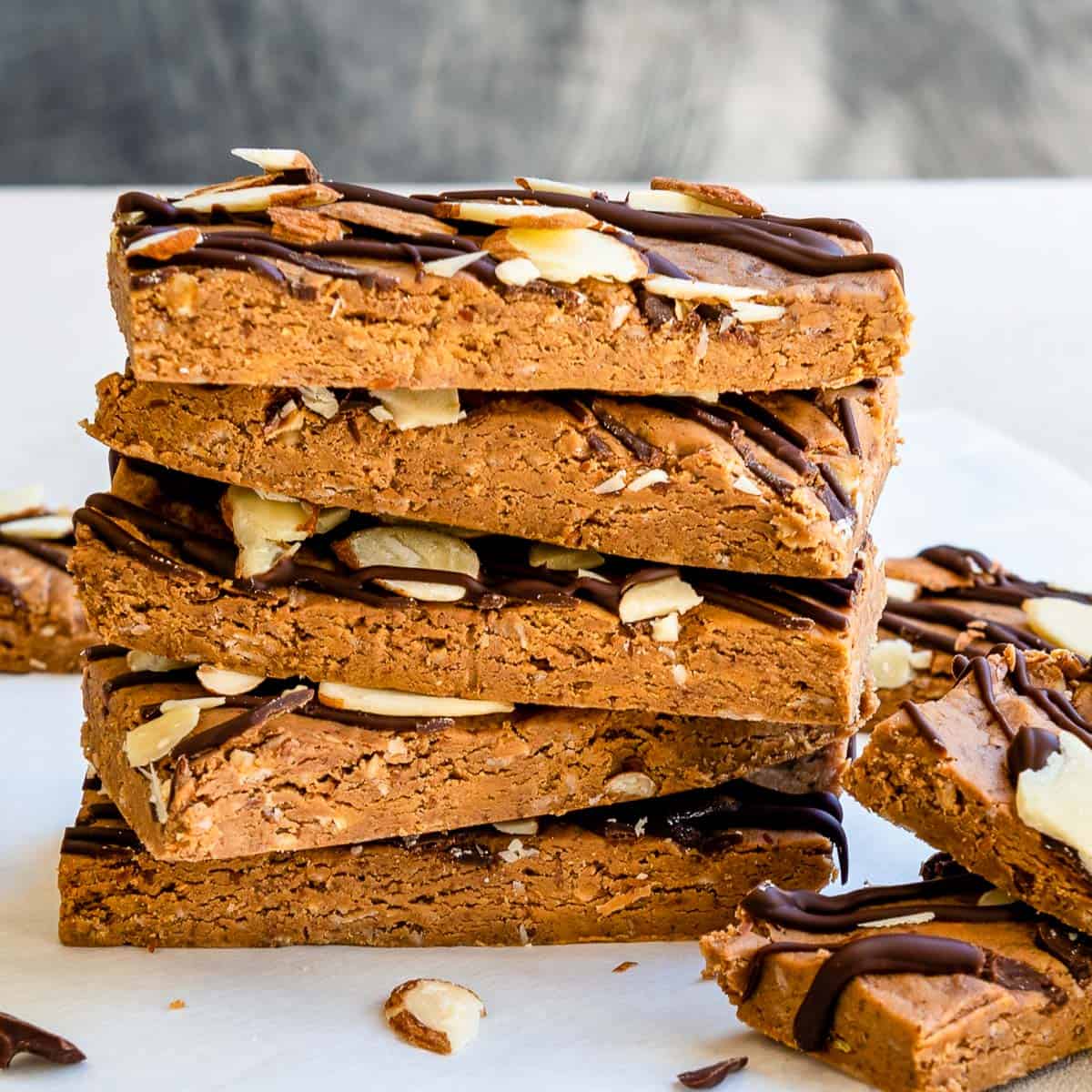 a stack of 5 no bake protein bars with oats