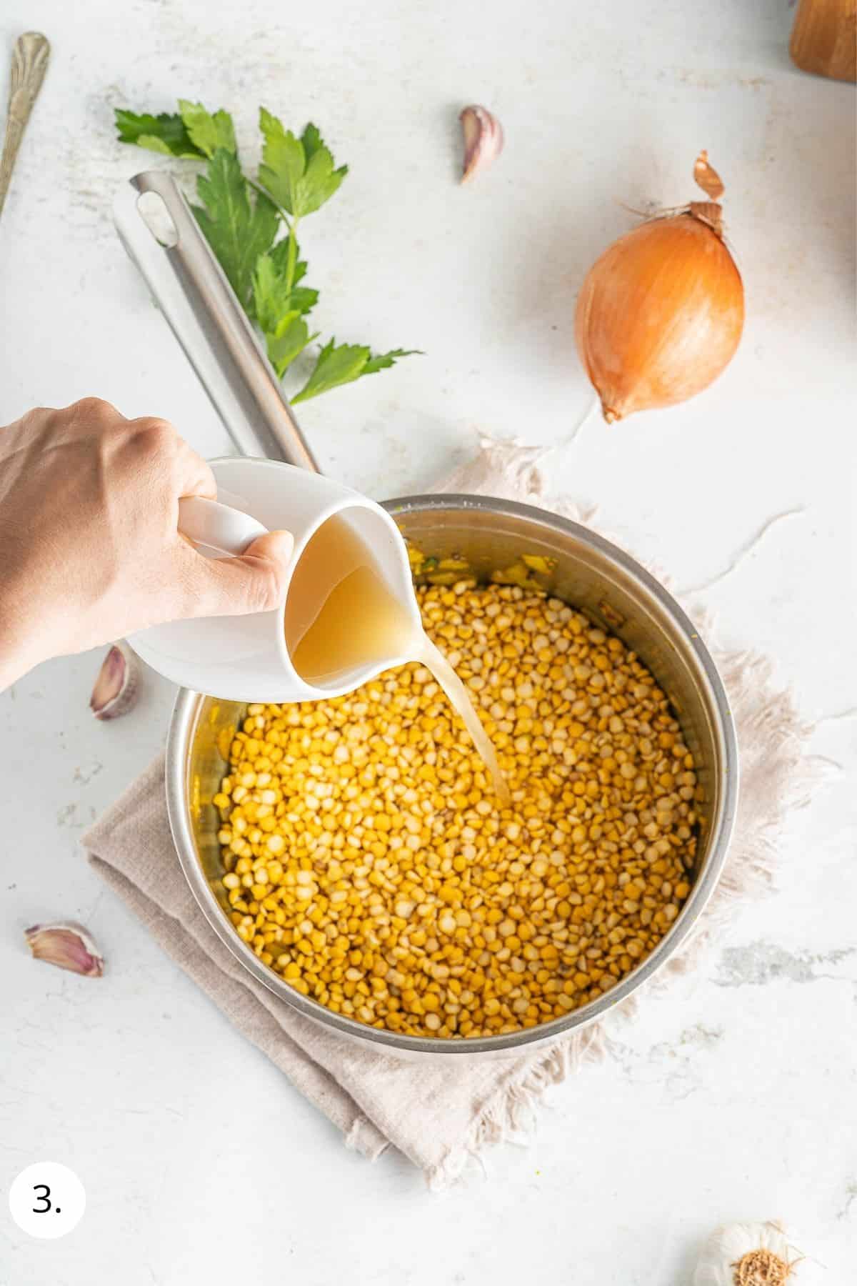 Add stock and lentils to pot