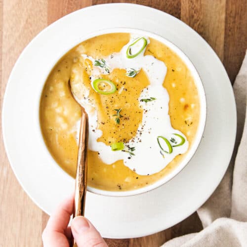 summer corn chowder with cream drizzle