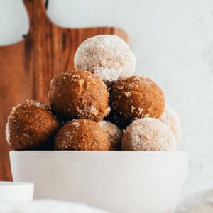 carrot cake balls stacked in a bowl