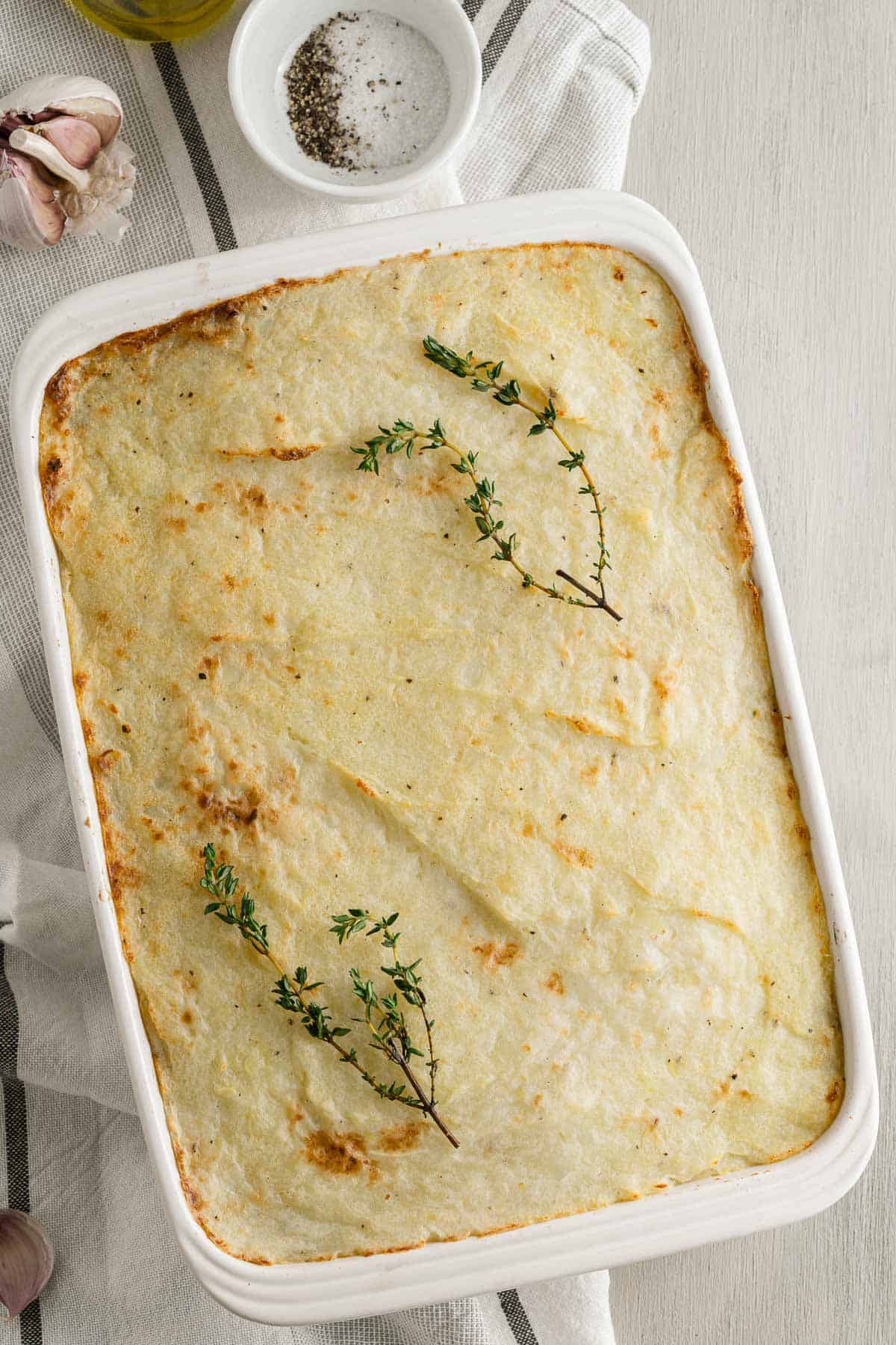 cooked lentil shepherds pie in a baking dish