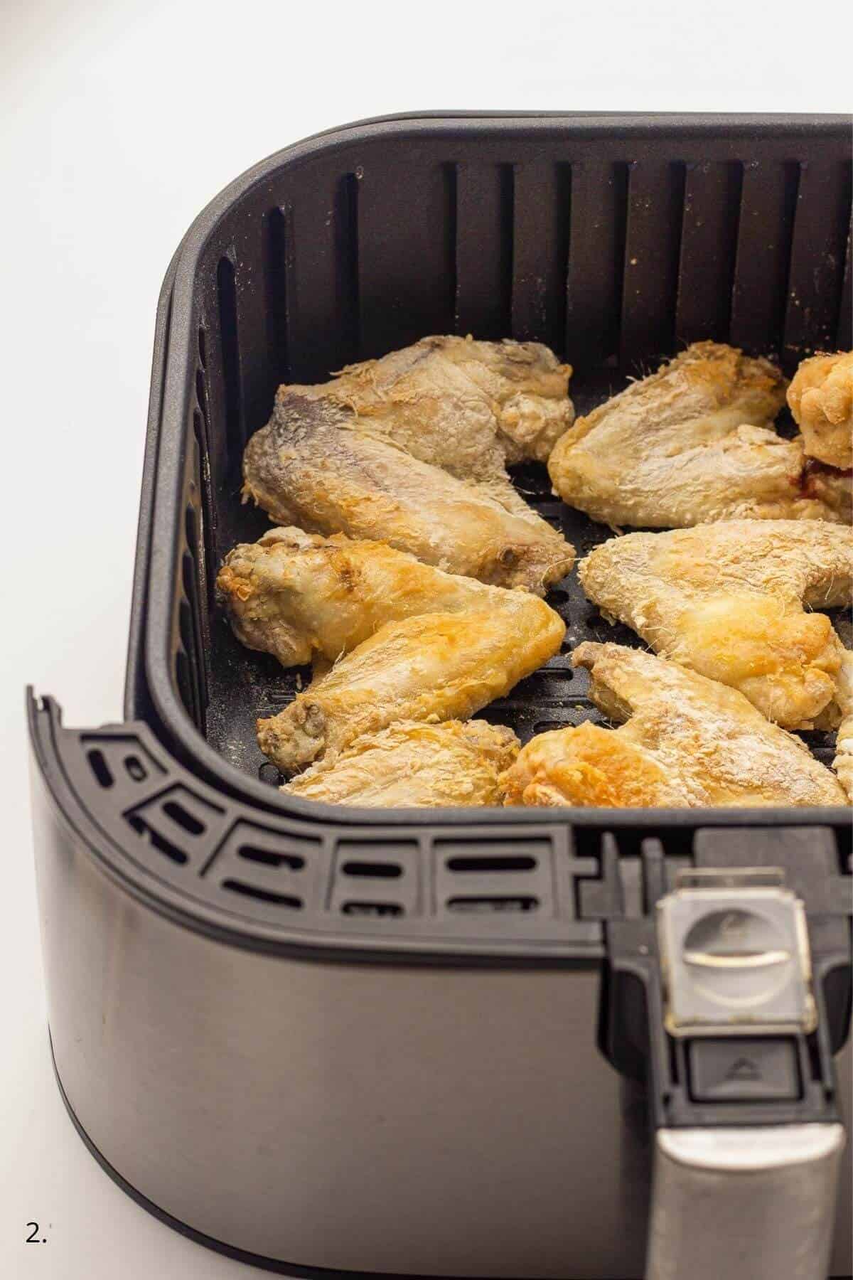 uncooked chicken wings in air fryer