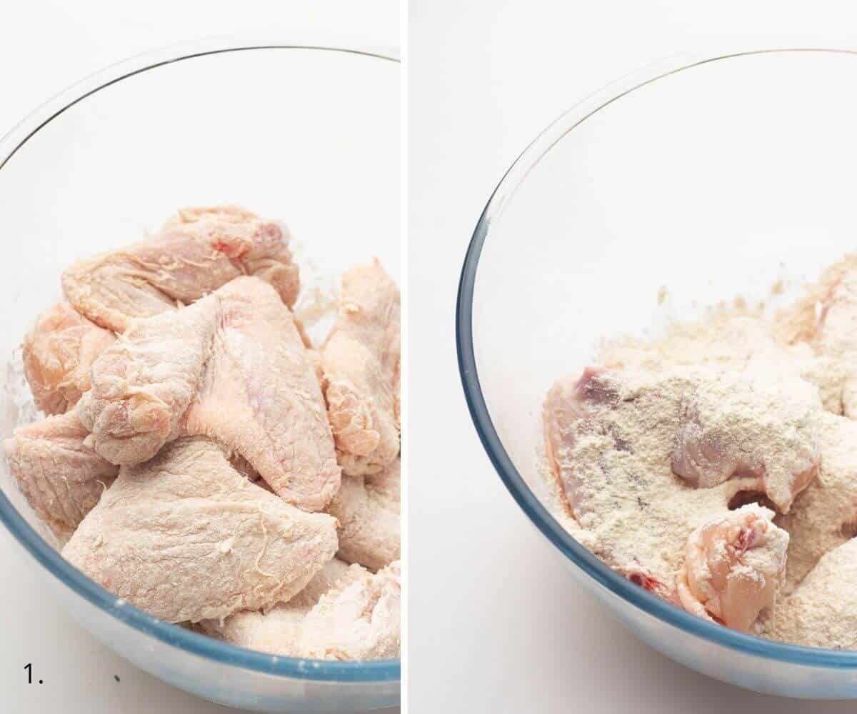 coating chicken wings in flour in a bowl