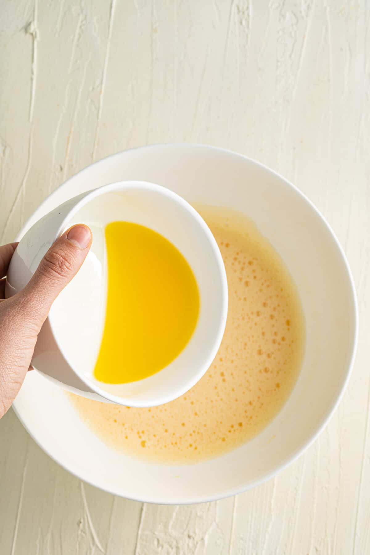 mixing wet ingredient in a bowl