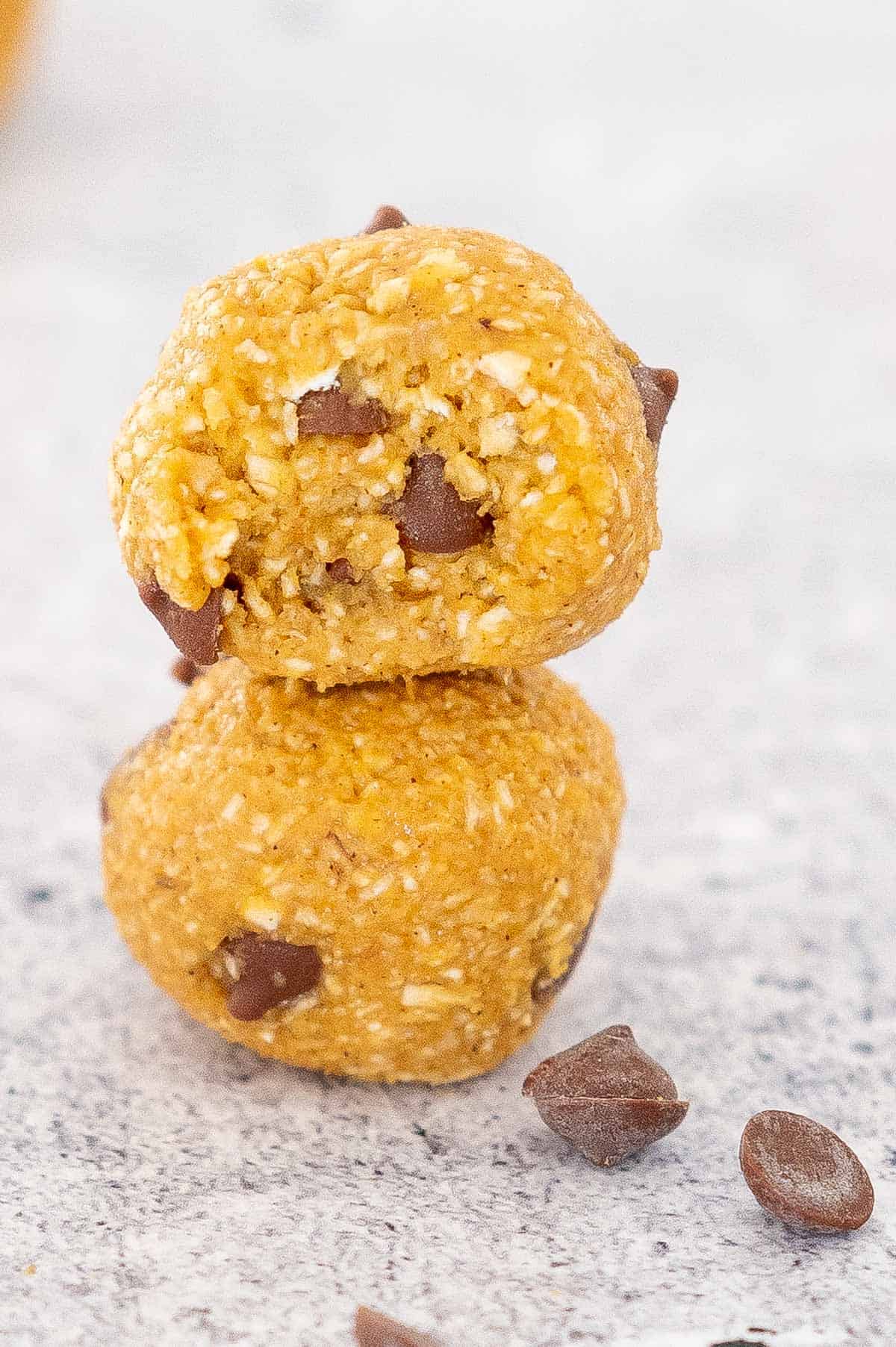 two pumpkin energy balls stacked on each other