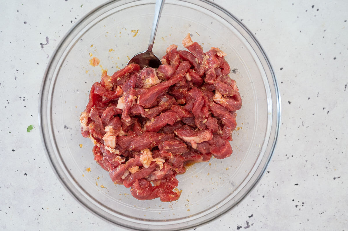 beef strips in a glass bowl