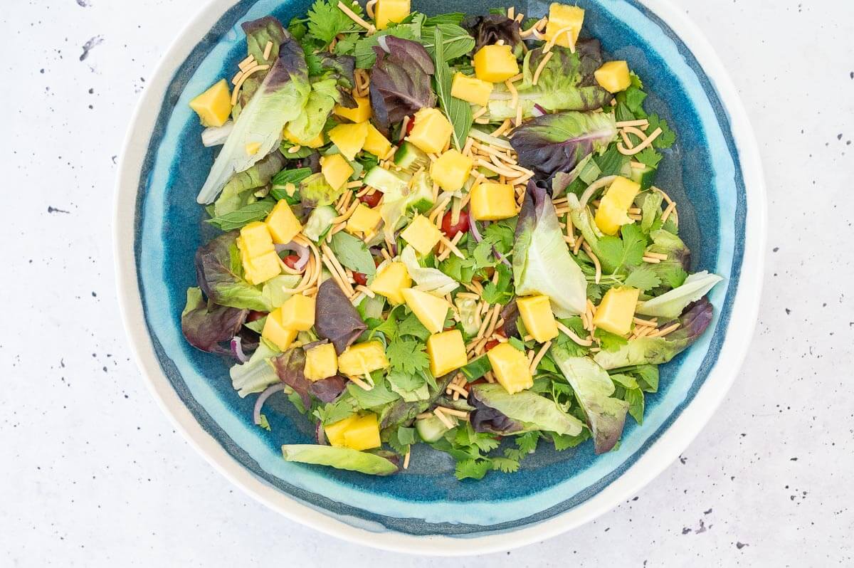 thai salad with noodles and mango