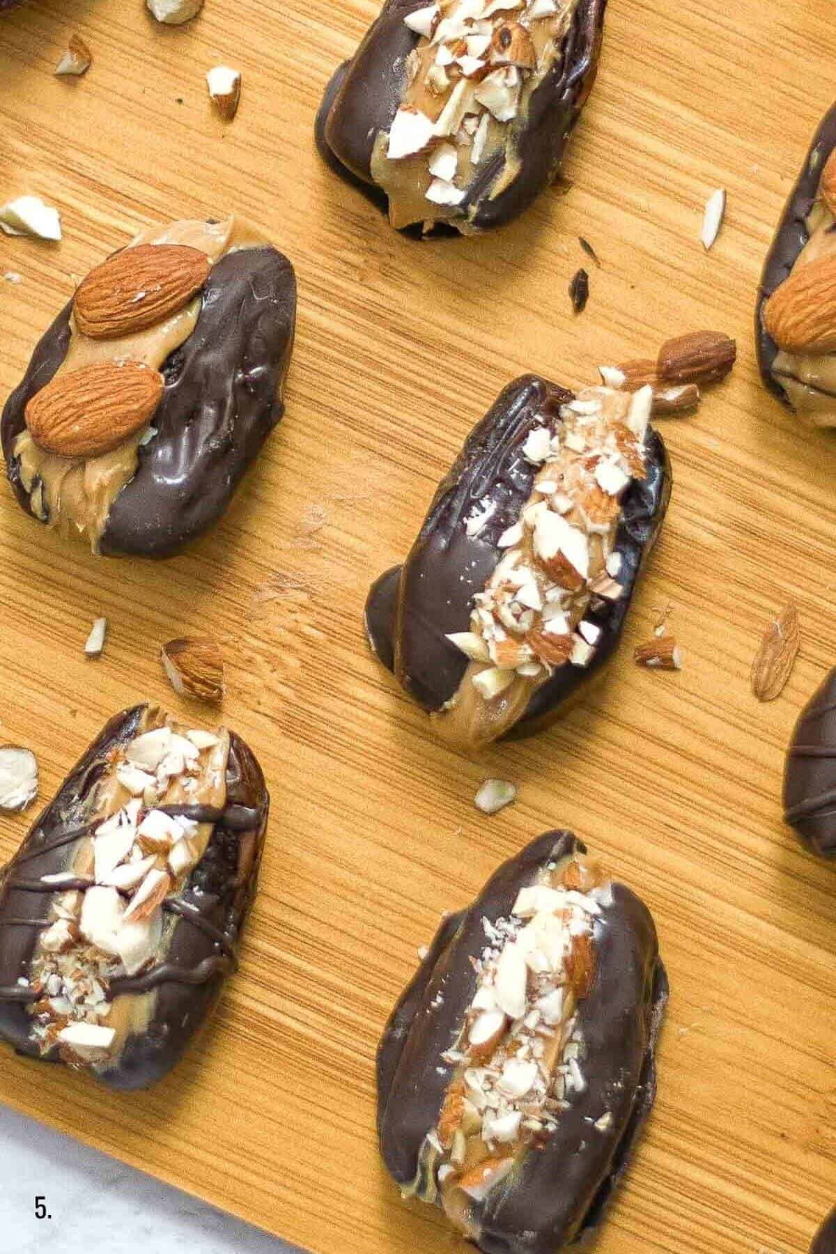 close up of chocolate peanut dates with almonds