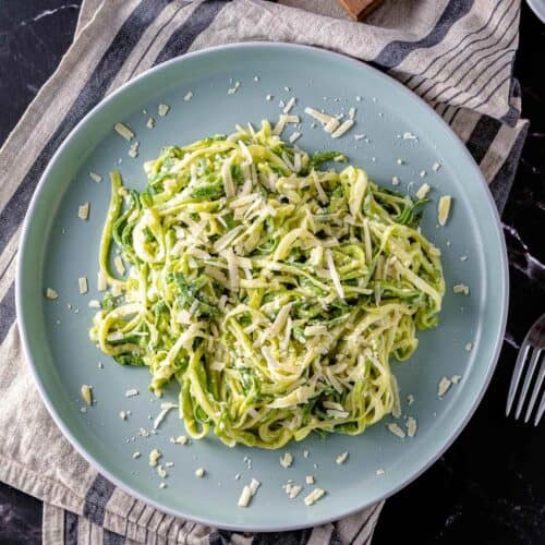 Garlic Parmesan Zucchini Noodles on a blue plate