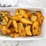 Air fryer smashed potatoes in a rectangle dish