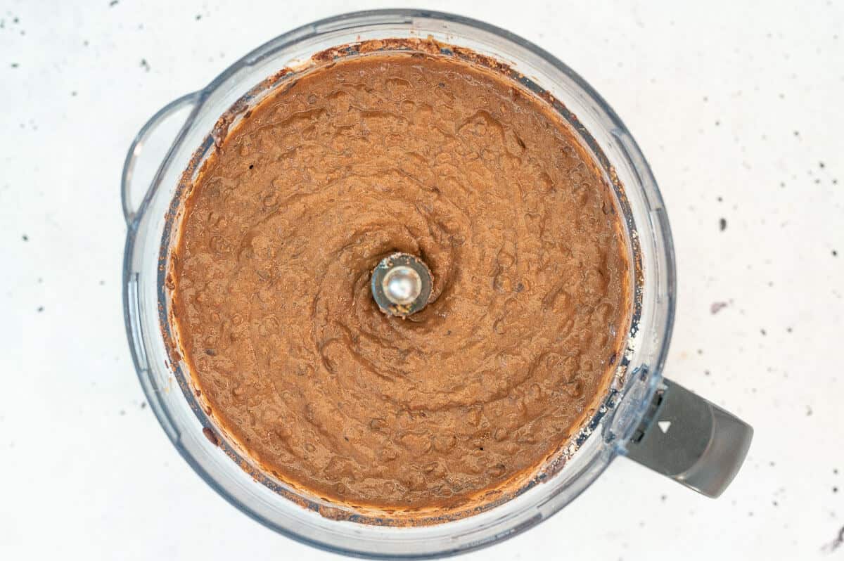 chocolate black bean batter in a food processor