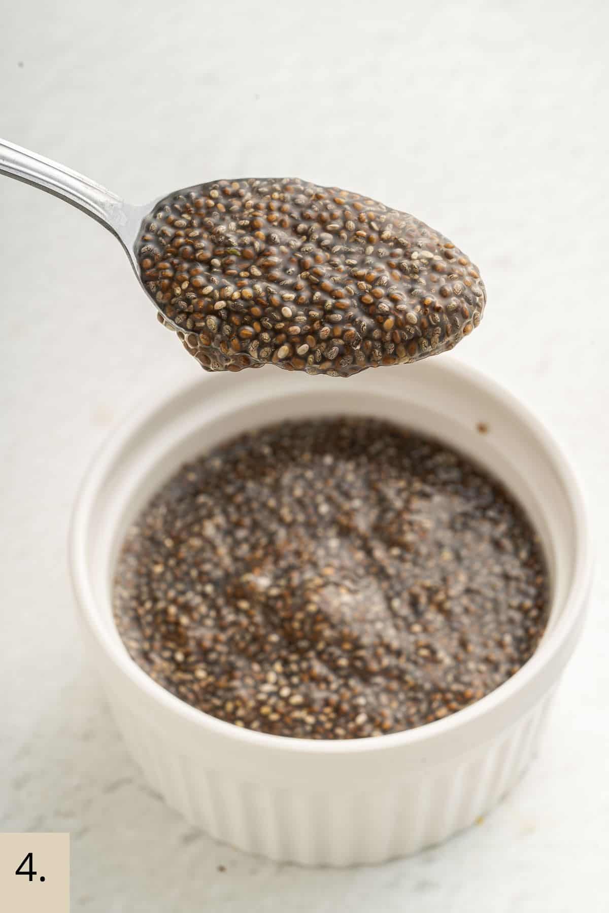 chia seeds and water on a spoon