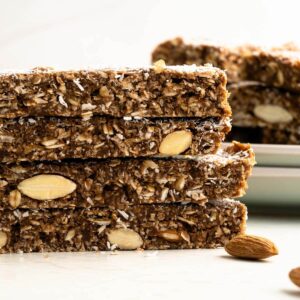 a stack of 3 chocolate no bake granola bars