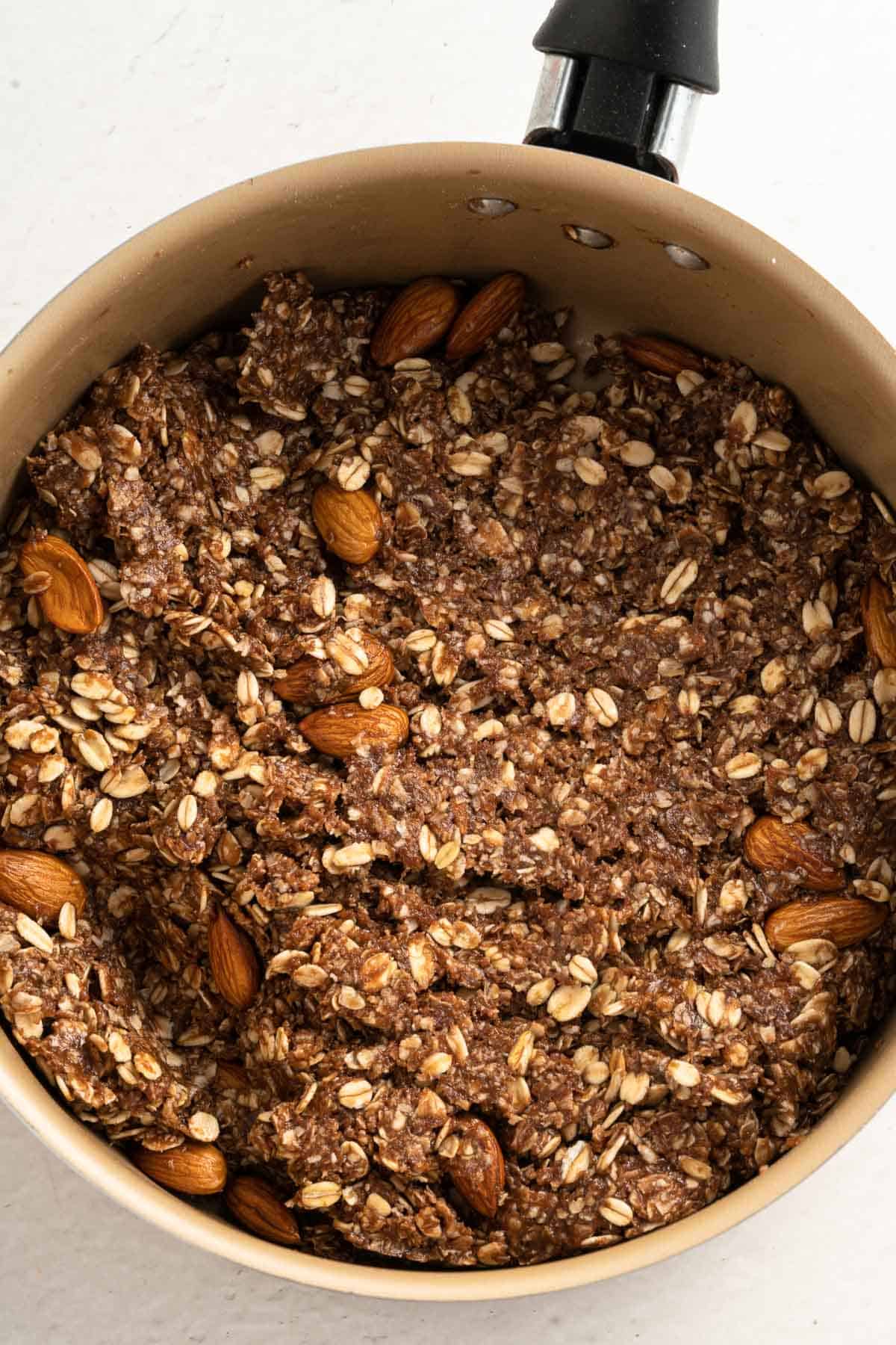 chocolate oat granola bar mixture in a pot