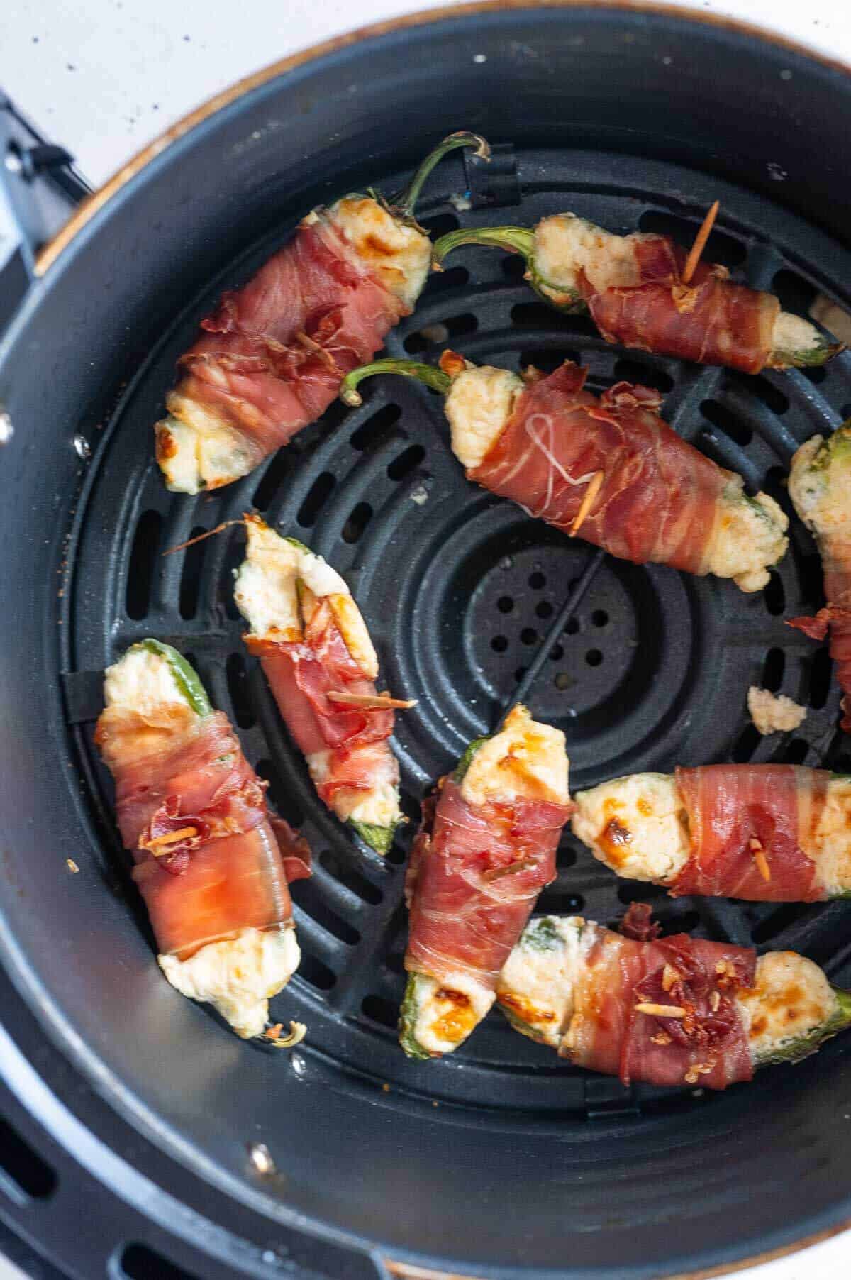 bacon wrapped jalapeno poppers in an air fryer