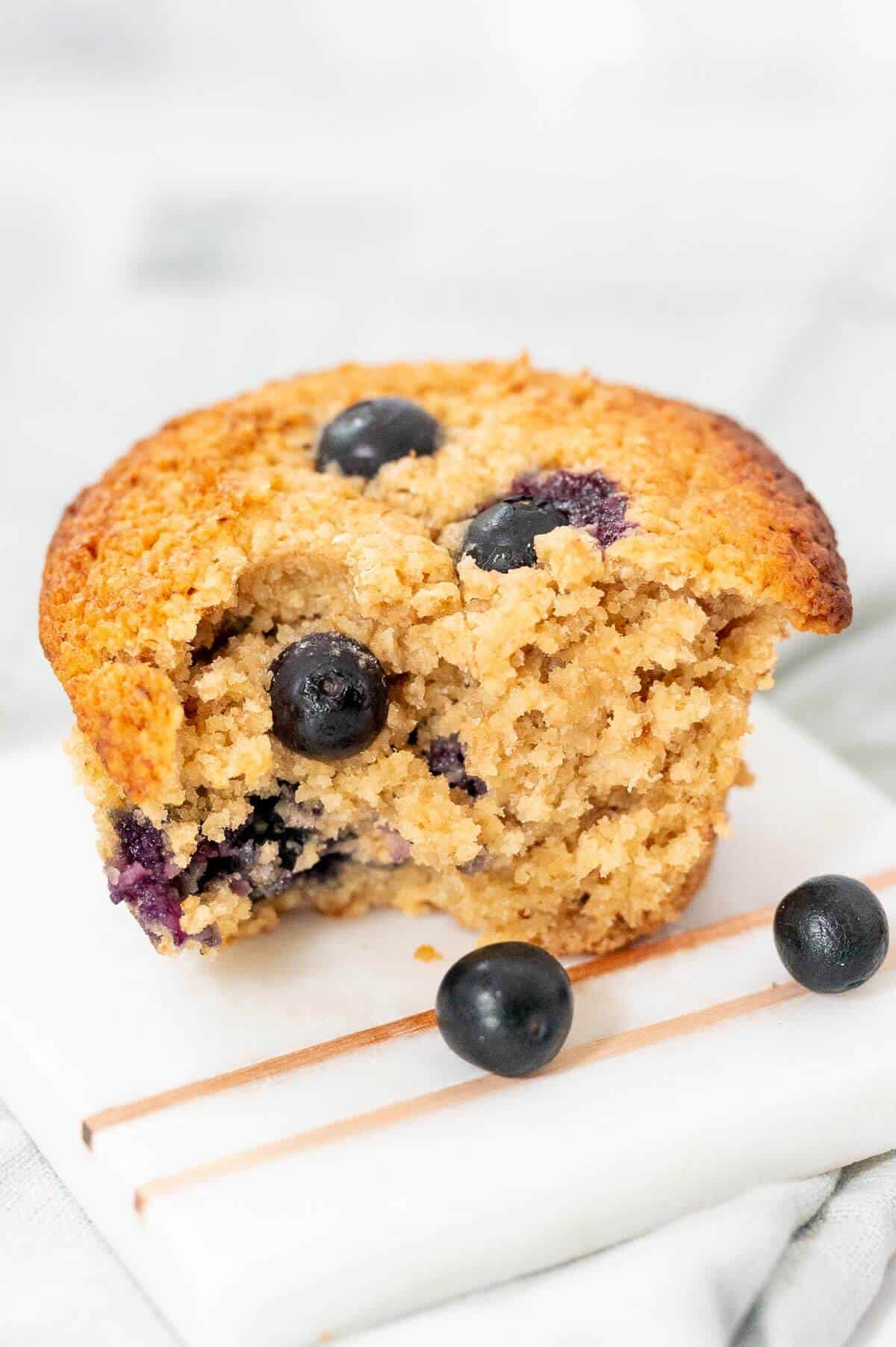 healthy blueberry muffin with a bite out