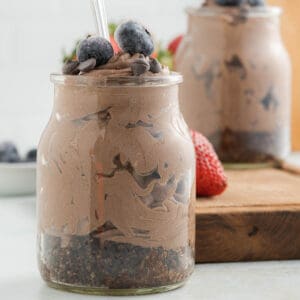 Chocolate cheesecake in a jar with blueberries