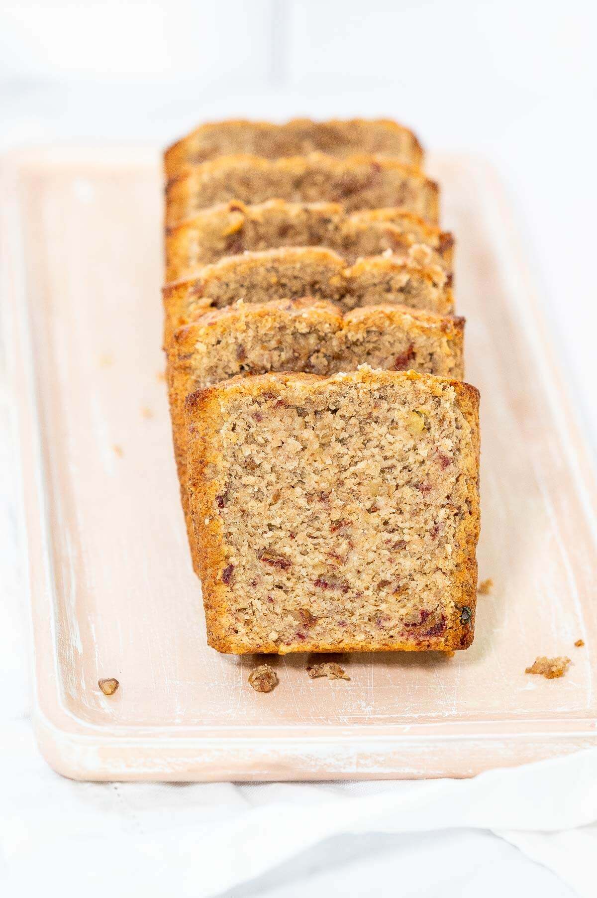 slices of oat flour banana bread on serving tray