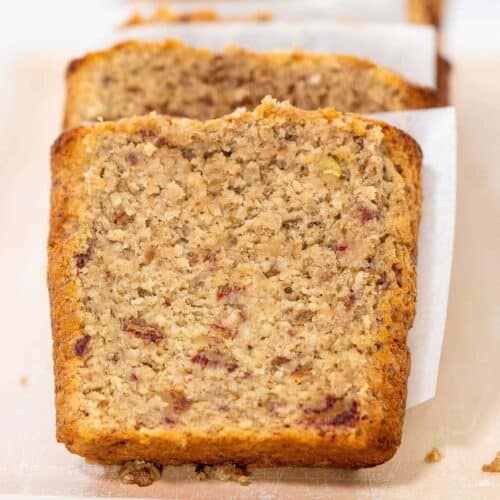a single slice of oat flour banana bread resting on a platter