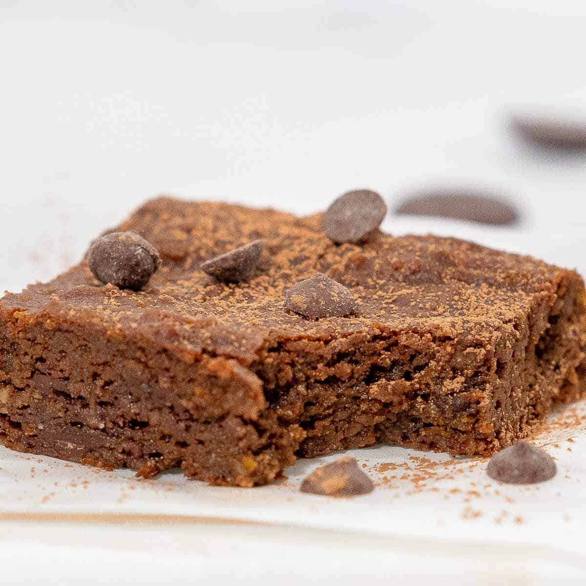 Healthy pumpkin brownie with a bite taken out