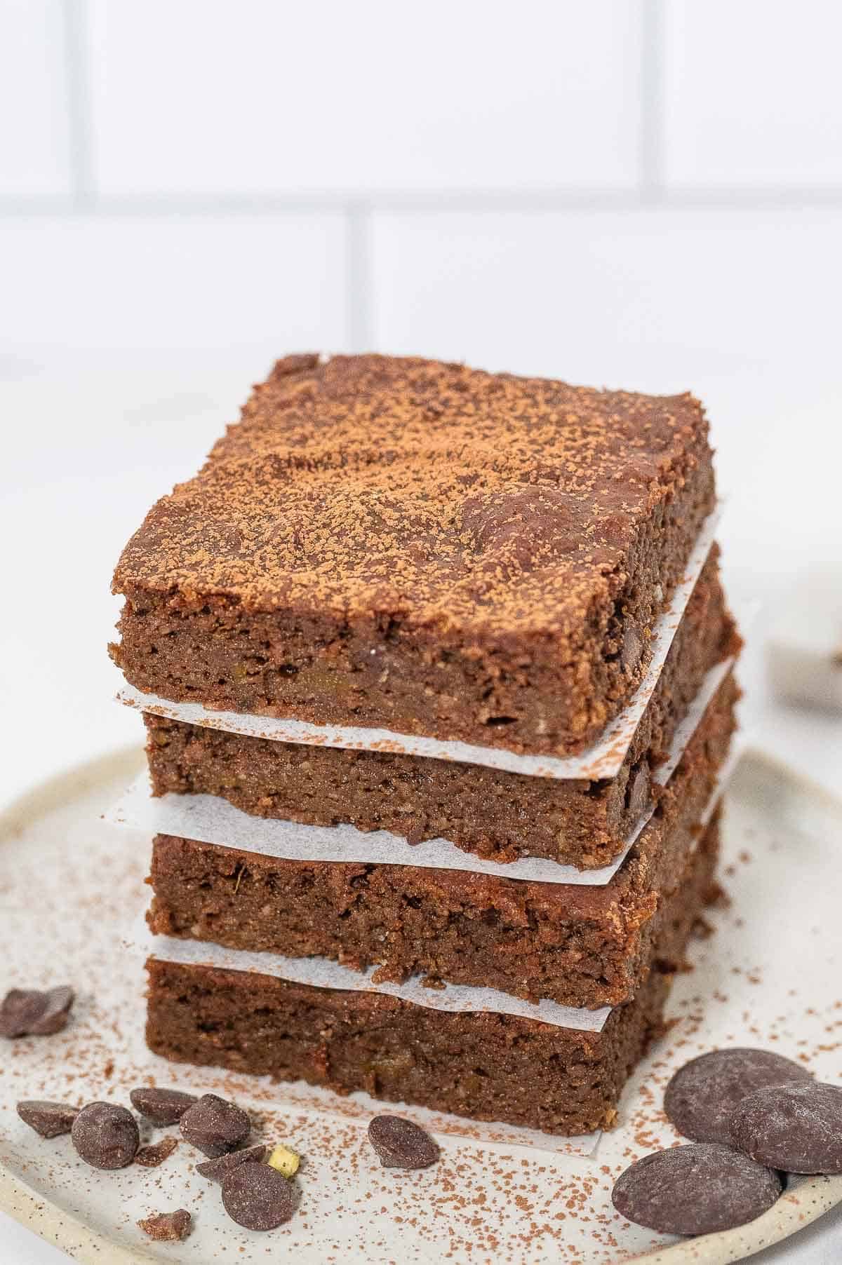 pumpkin brownie stack with choc chips on a plate