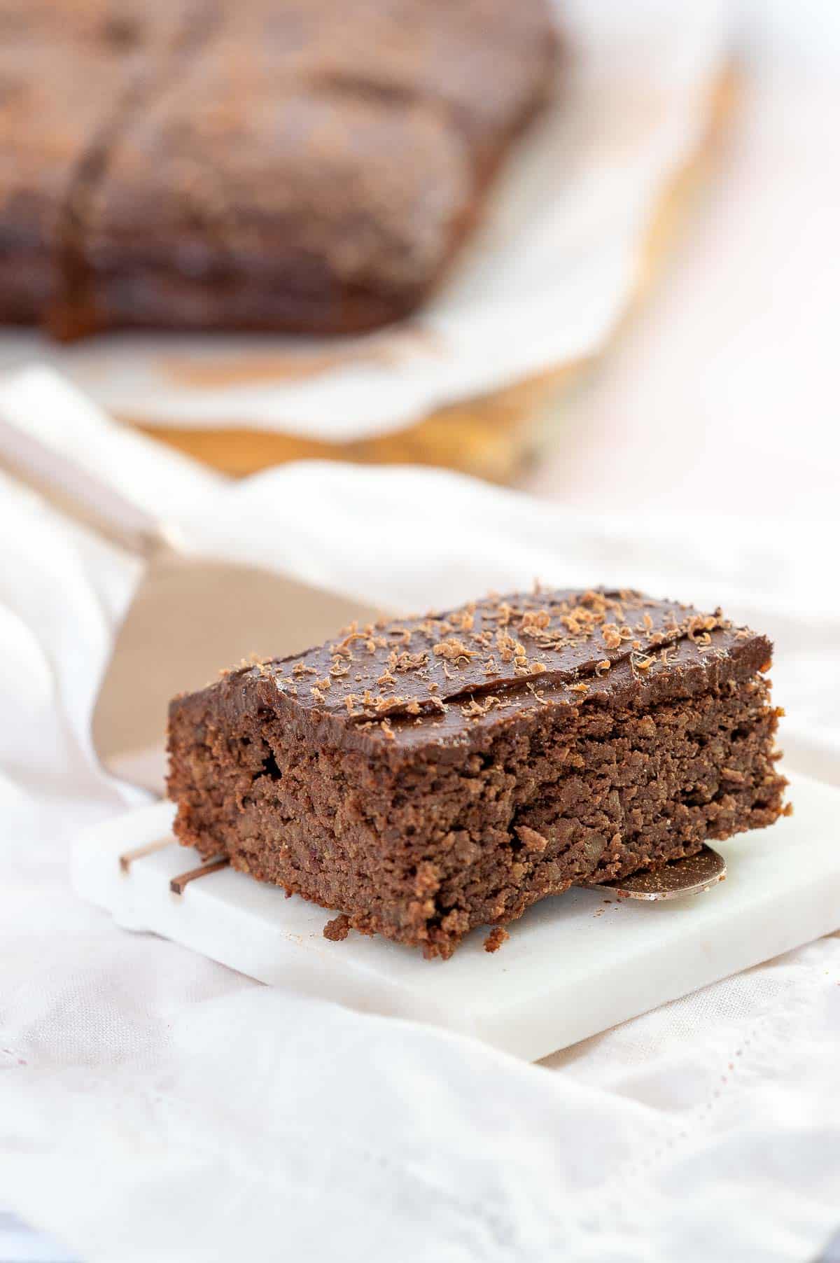 small square slice of chocolate chickpea cake
