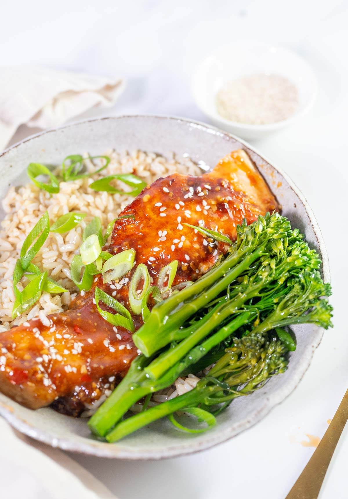 glazed salmon fillet with greens and rice