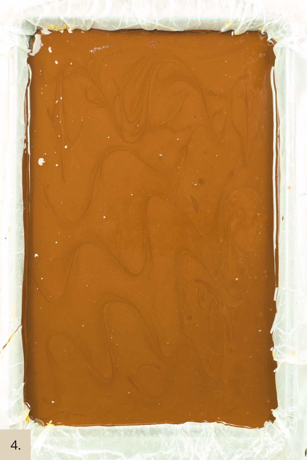 chocolate poured on top of date nut base