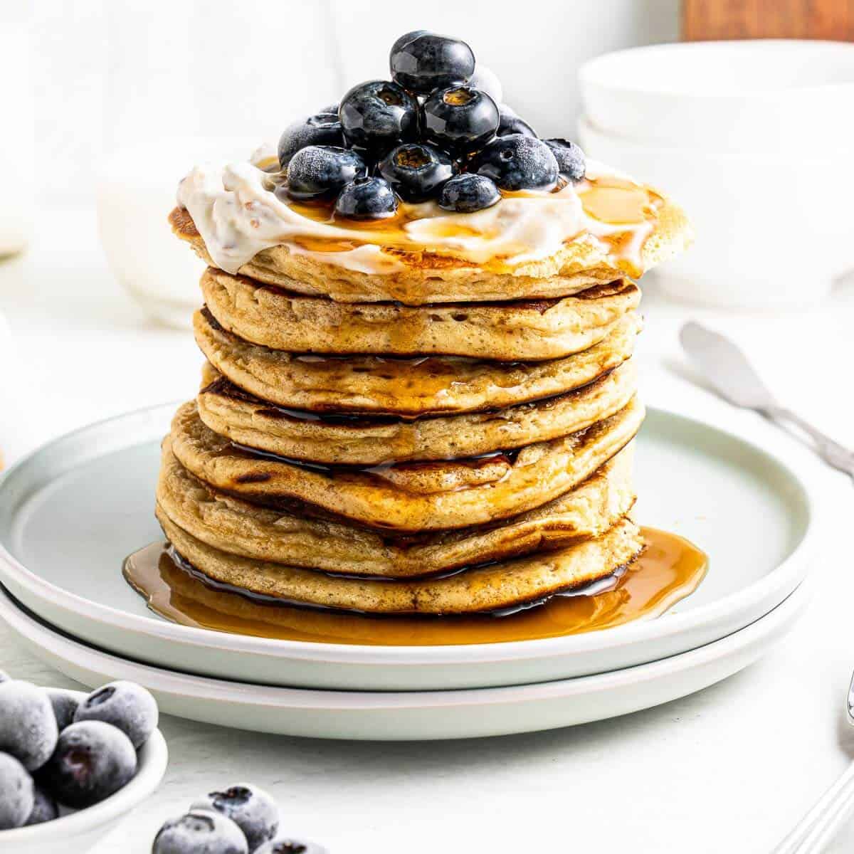 protein pancake stack no bananas with yoghurt and blueberries