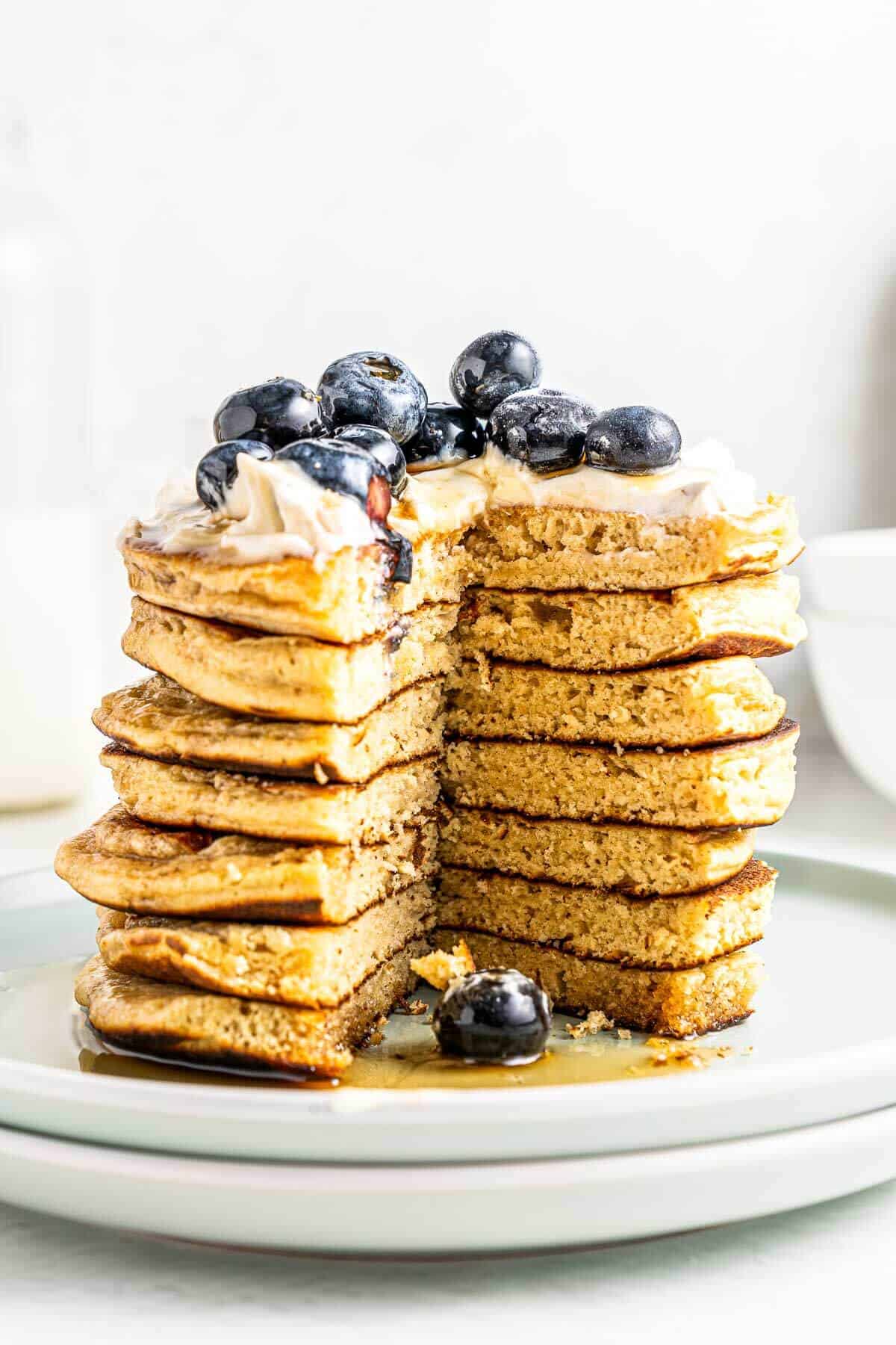 healthy high protein pancake stack with a wedge taken out