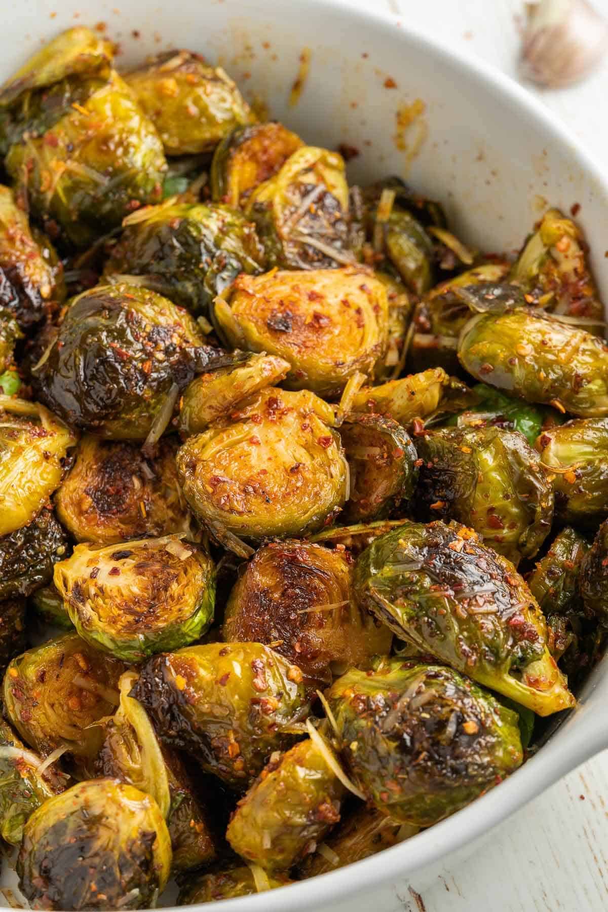 close up of garlic roasted brussel sprouts with parmesan