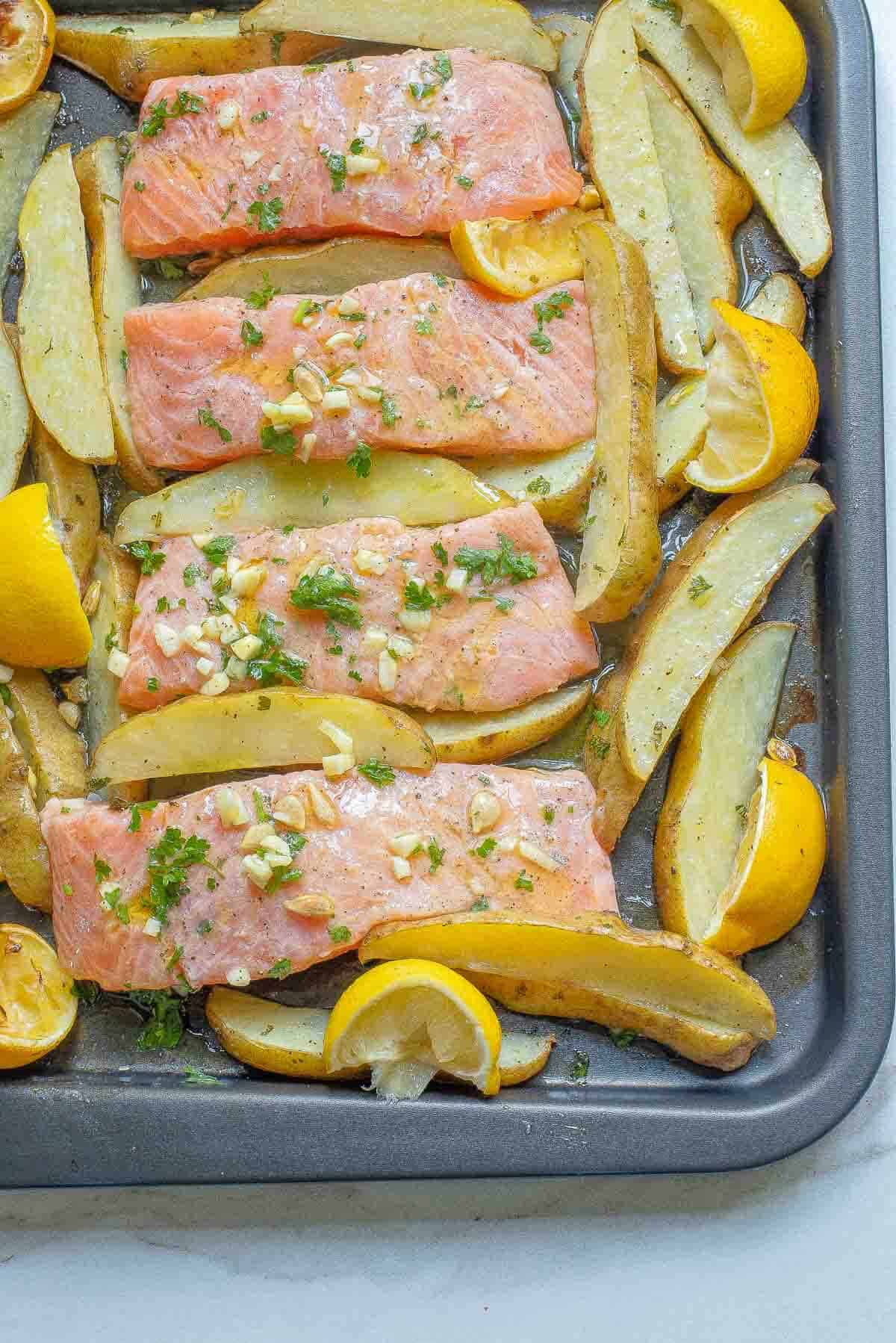 garlic salmon and potato on a sheet pan