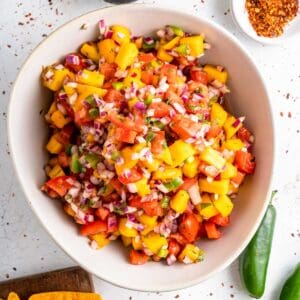diced mango and tomato salsa with red onion