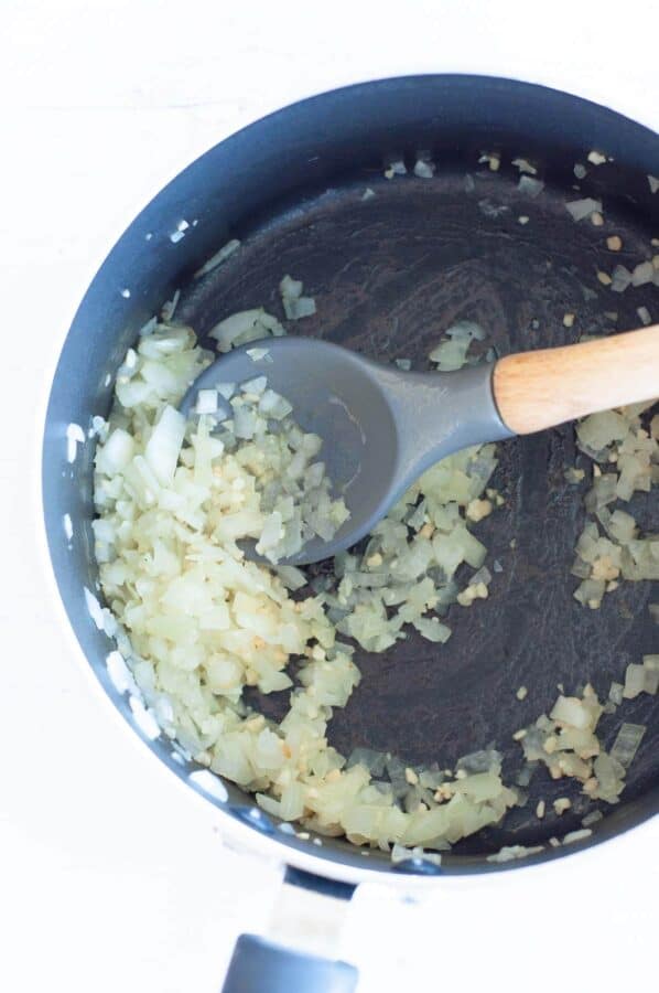 cooking onions in a pot