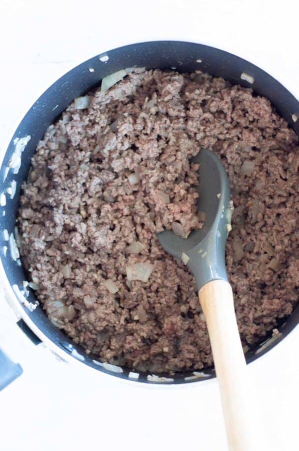 cooking beef mince and onion in a pot