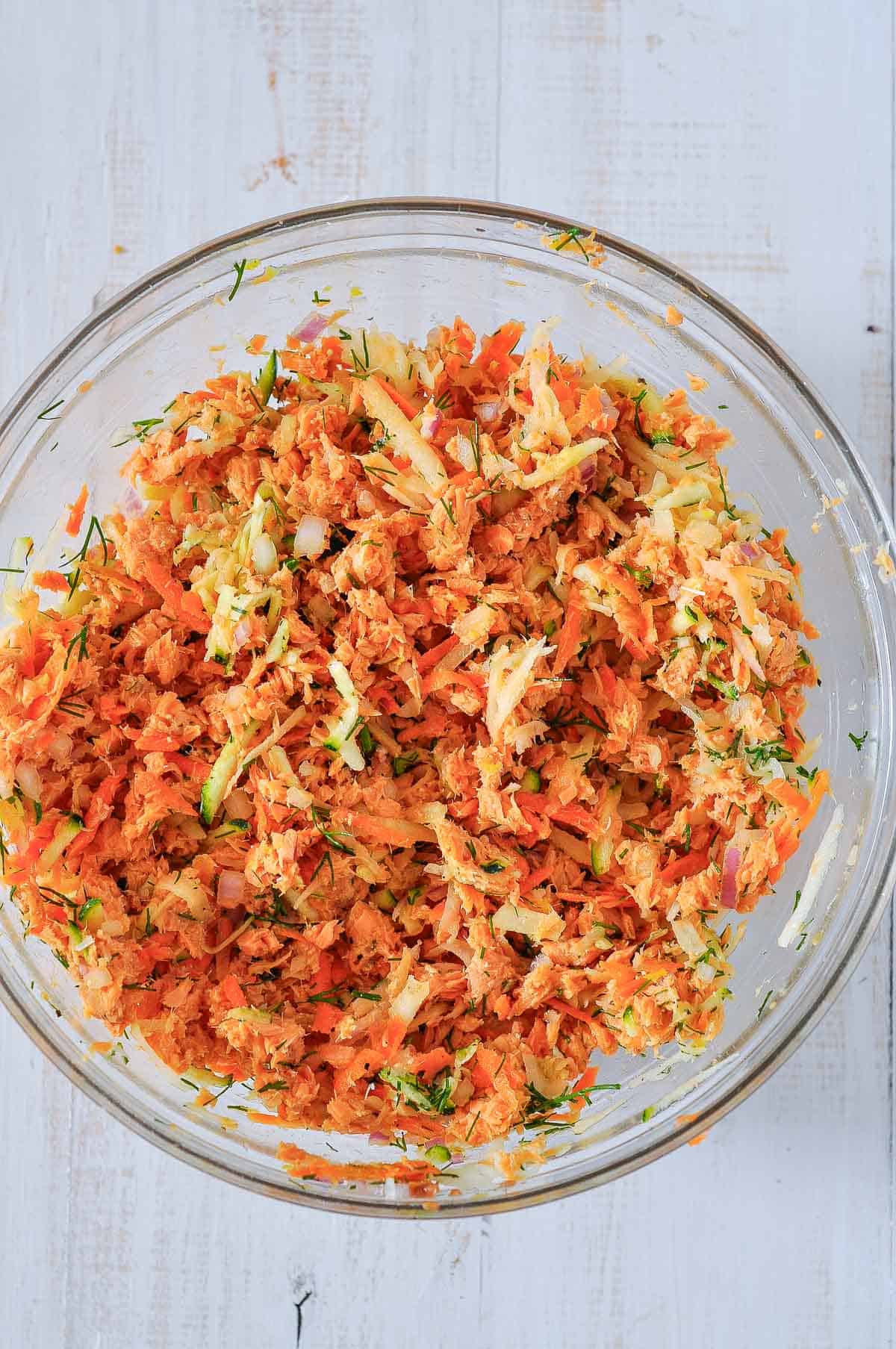 salmon zucchini fritter mixture in a bowl